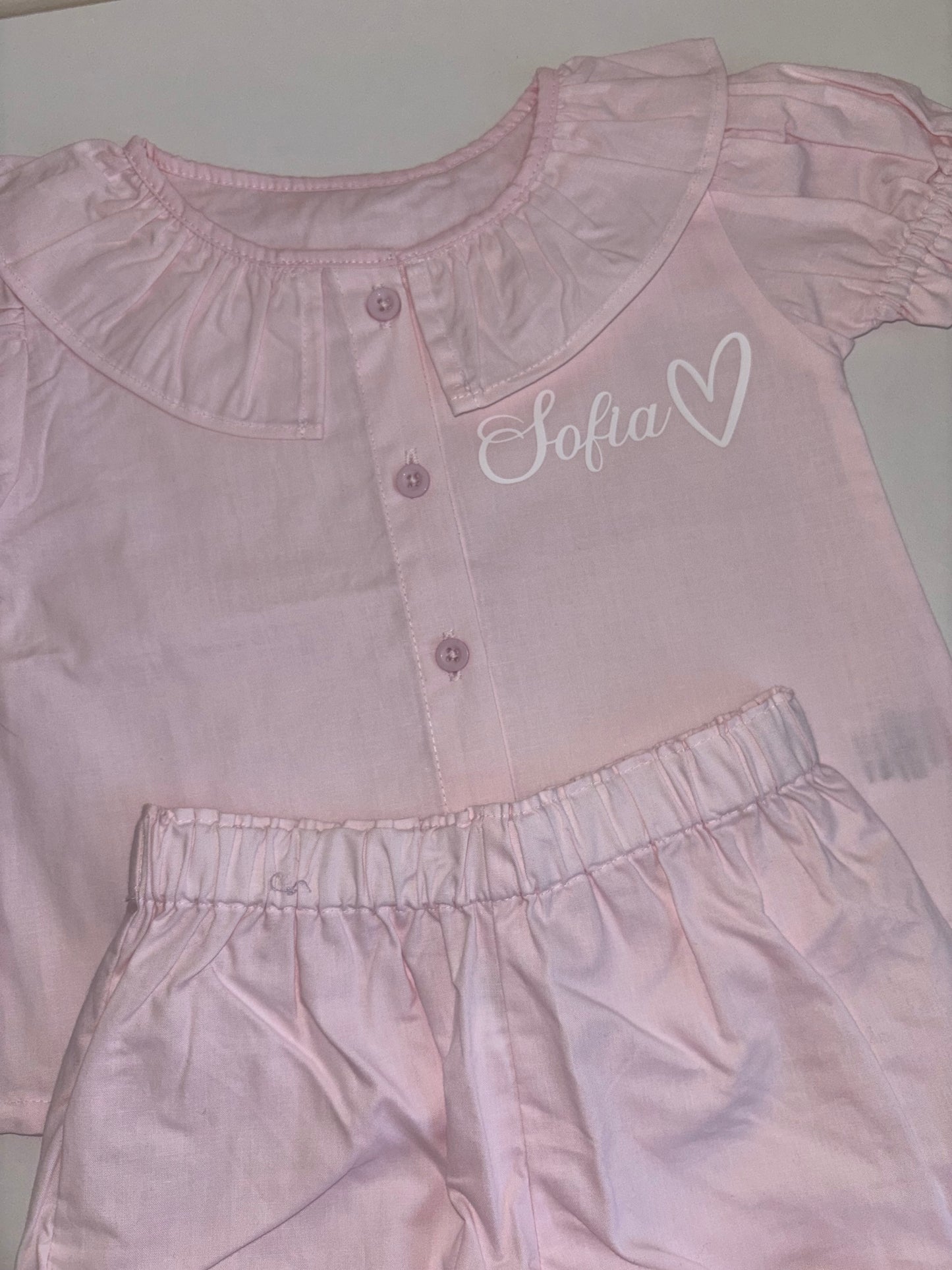 Pastel pink frilly shorts pyjamas